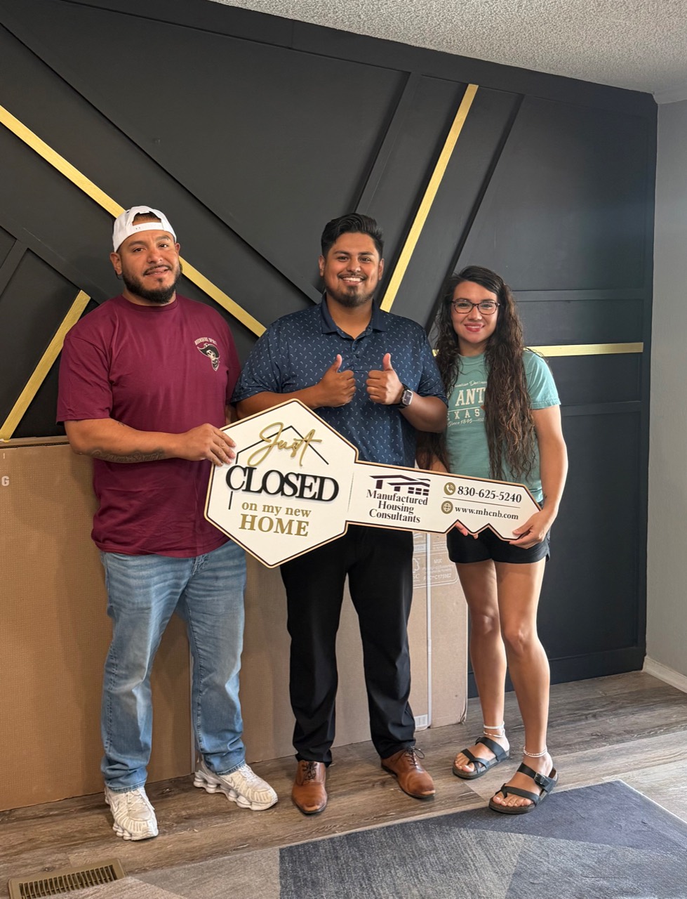 Kevin celebrating a home closing with buyers